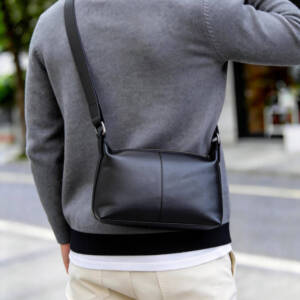 Center Seam Soft Leather Crossbody Bag Matte Black Adjustable Wide Strap Unisex Daily Commute Bag